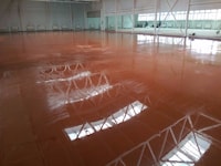 Concrete floor with color surface hardeners (freshly laid)